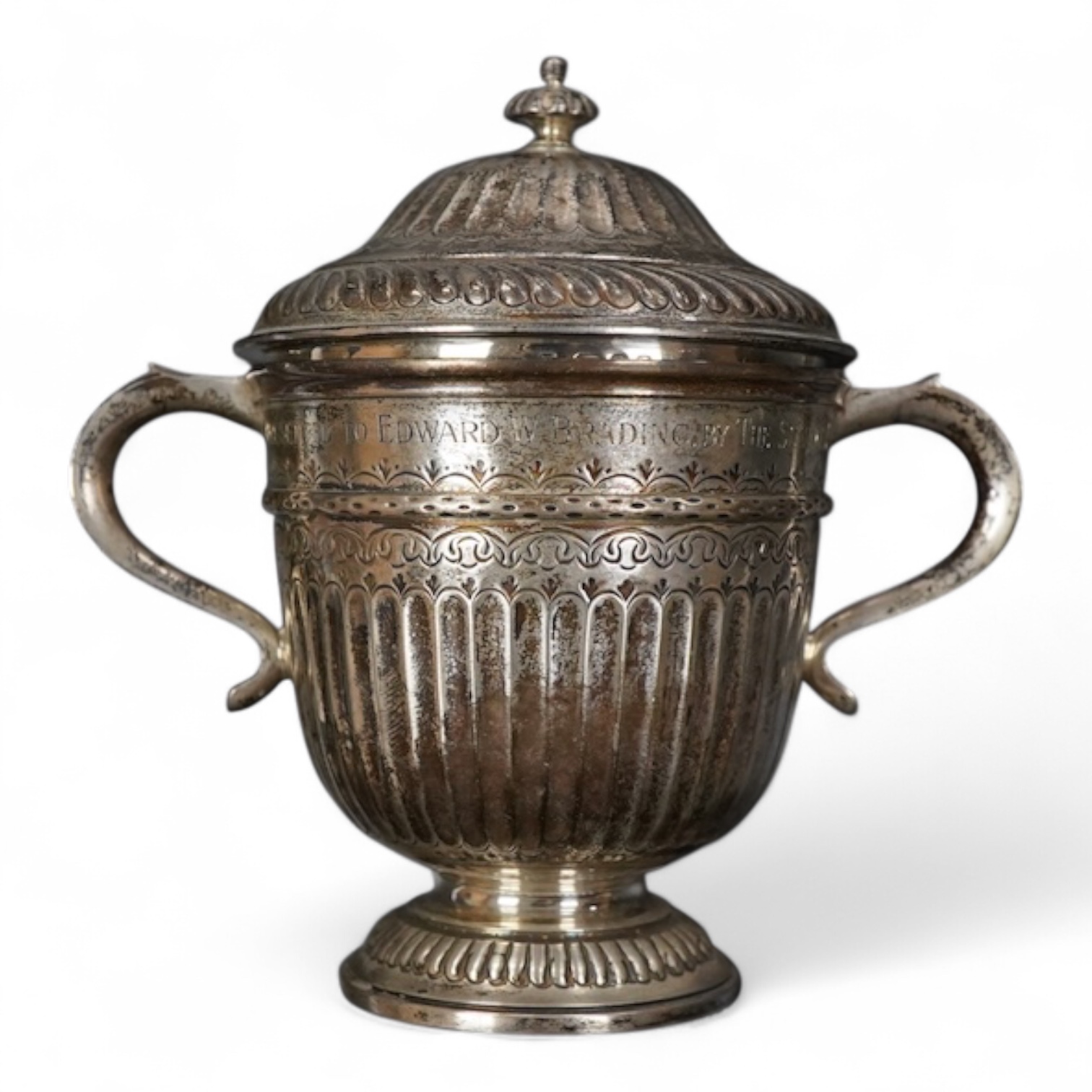 A George V silver twin handled loving cup and cover in early 18th century style height 11cm. , weight approx. 6.56ozt